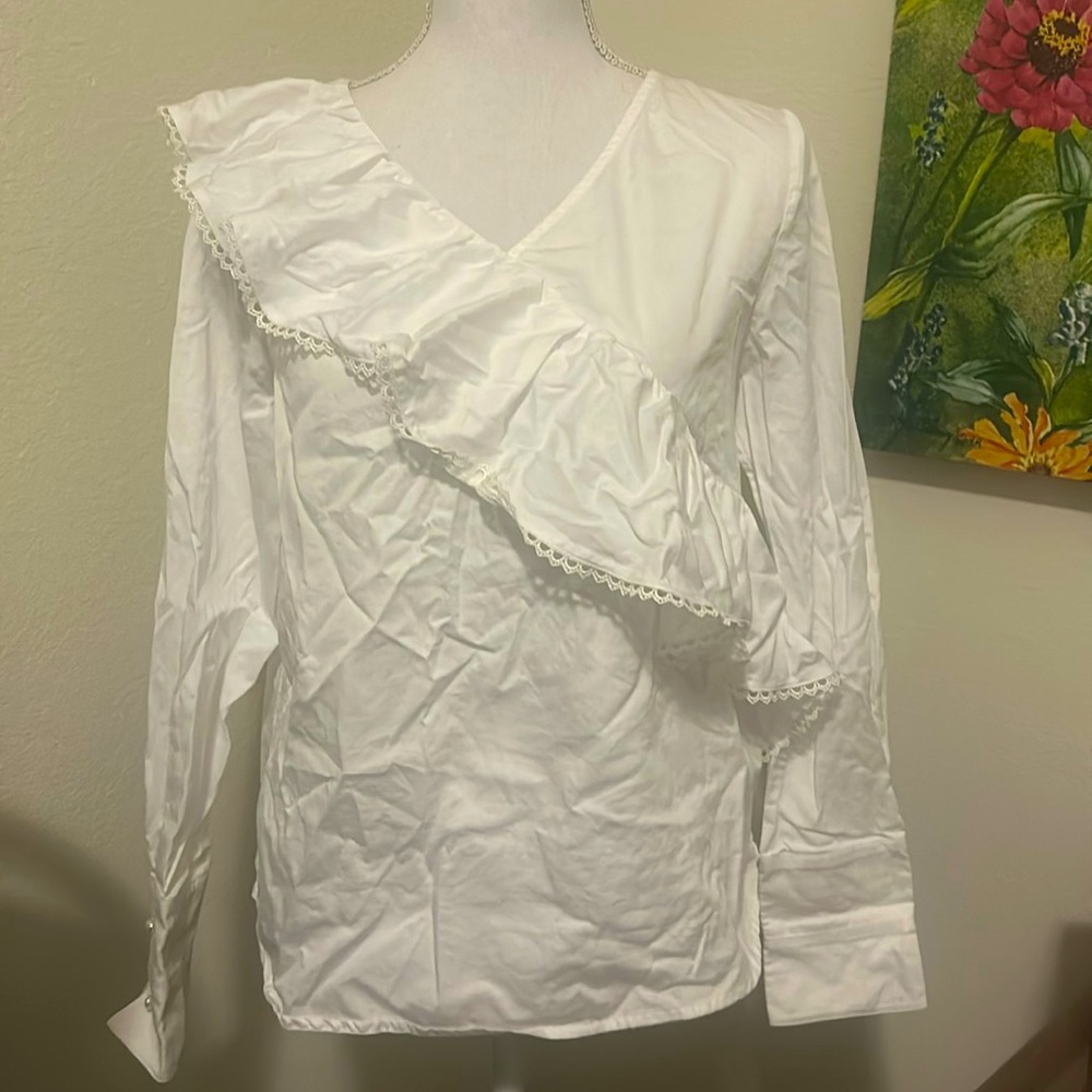 White flounce blouse